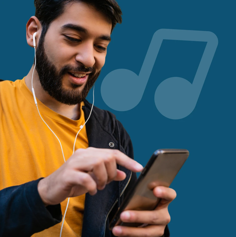 Man listing music